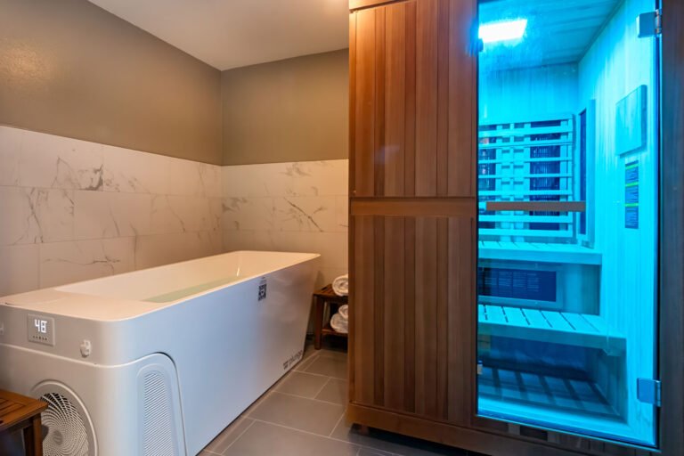 Private contrast therapy room with cold plunge and hybrid sauna at Massage Reimagined in Lower Queen Anne